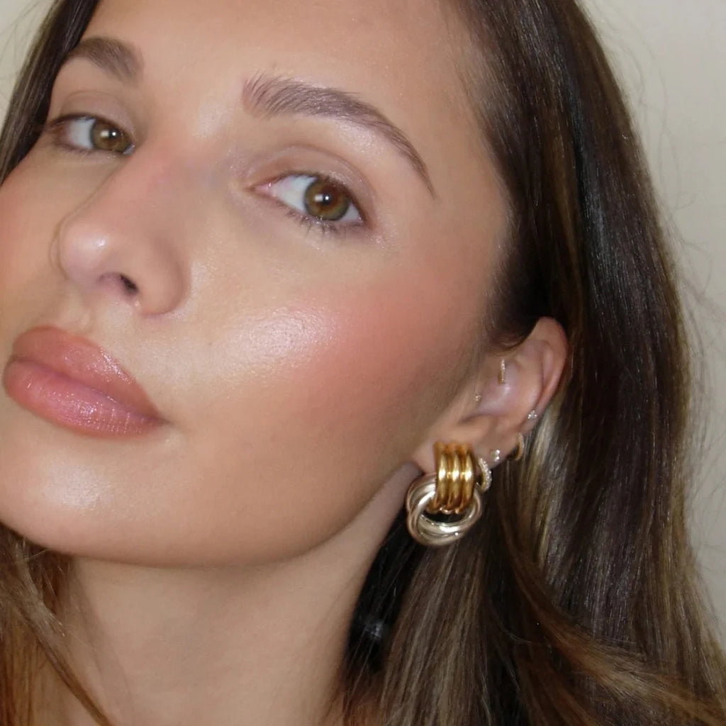 Gold Twist Knot Earrings – Minimal, Elegant Statement Design