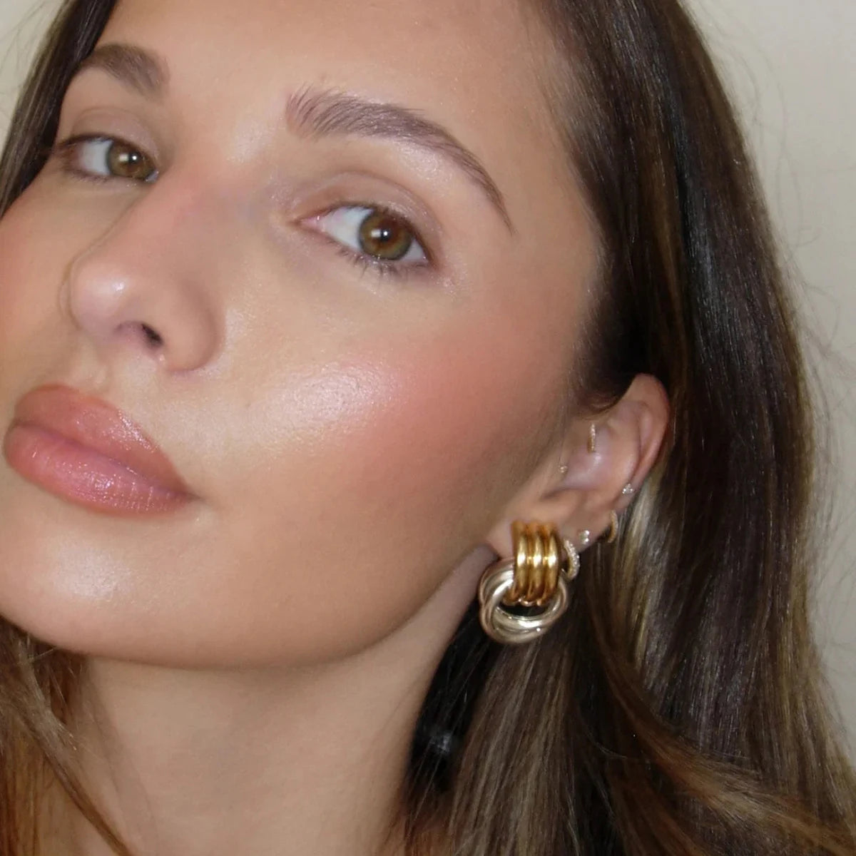 Gold Twist Knot Earrings – Minimal, Elegant Statement Design