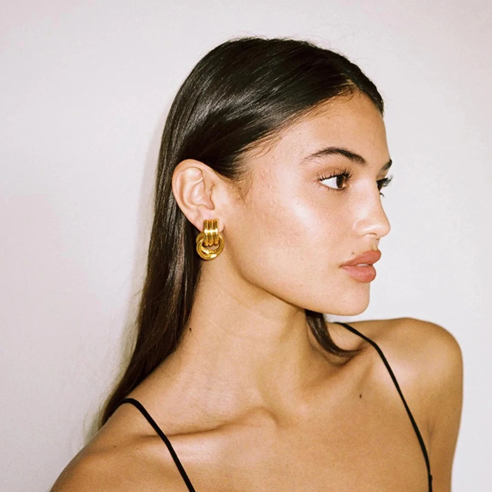 Gold Twist Knot Earrings – Minimal, Elegant Statement Design