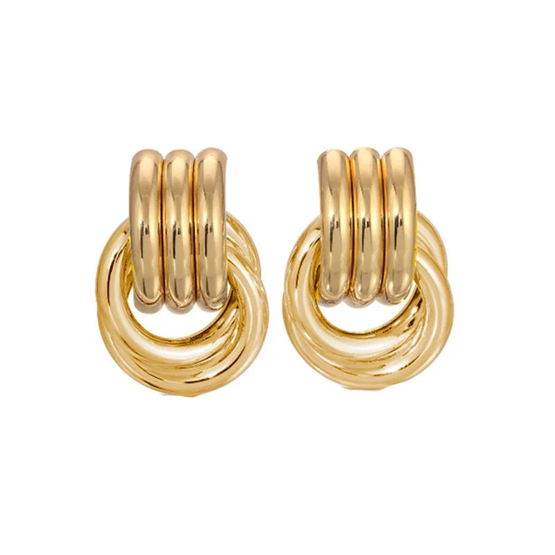 Gold Twist Knot Earrings – Minimal, Elegant Statement Design